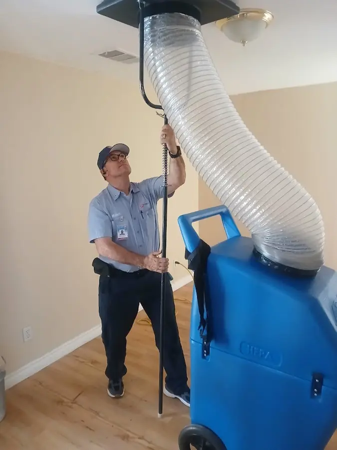 Mini Split Installation technician using HEPA equipment in Manassas